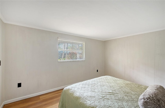 bedroom featuring hardwood / wood-style floors