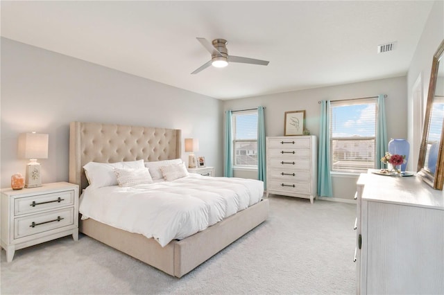 bedroom featuring ceiling fan and light colored carpet