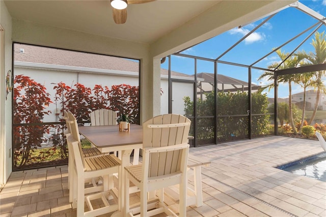 sunroom / solarium with ceiling fan