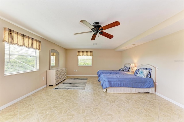 bedroom featuring ceiling fan