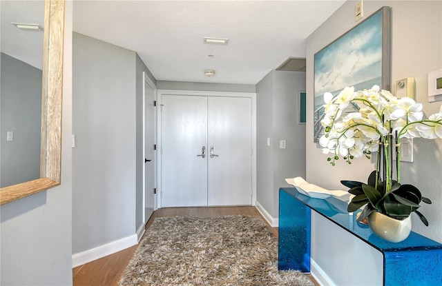 entrance foyer with hardwood / wood-style floors