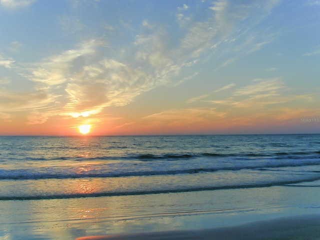 property view of water featuring a beach view