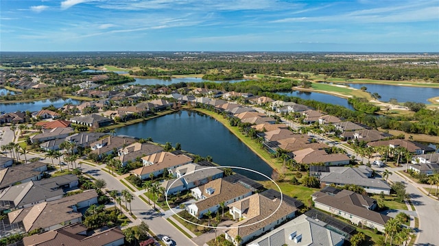 drone / aerial view featuring a water view