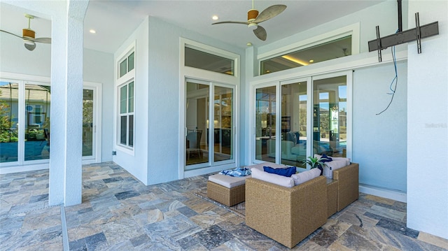 view of patio / terrace featuring ceiling fan