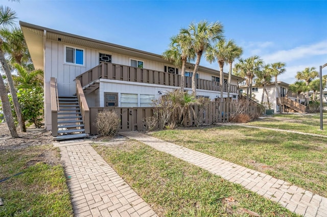 exterior space with a front lawn