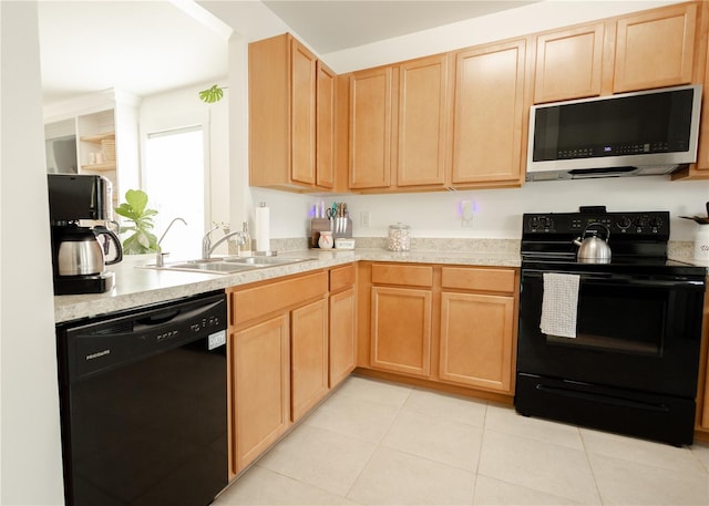 kitchen with black appliances, light tile patterned floors, sink, and light brown cabinetry