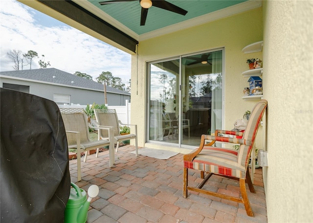 view of patio / terrace featuring ceiling fan and a grill