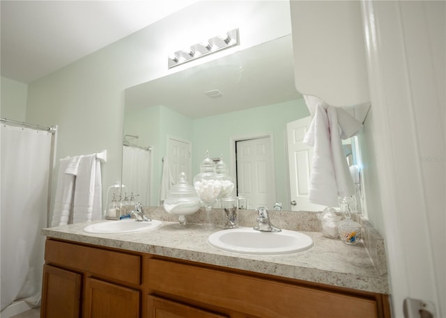 1877 Dragonfly Ave, North Port, FL 34288 - full bath with double vanity and a shower with shower curtain