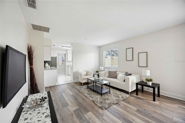 living room featuring light hardwood / wood-style floors