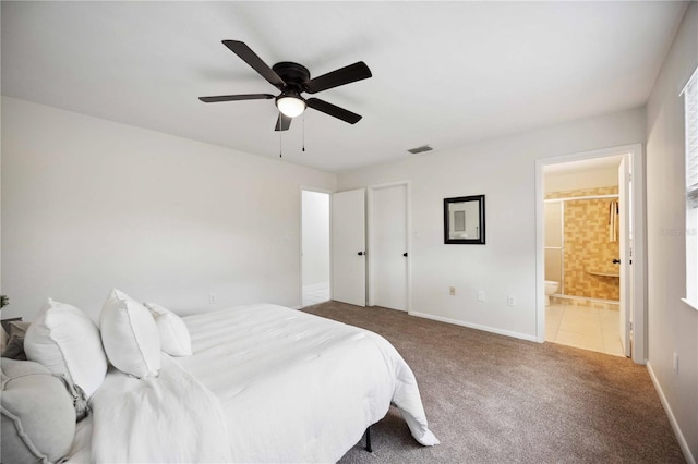 bedroom featuring carpet flooring, connected bathroom, and ceiling fan