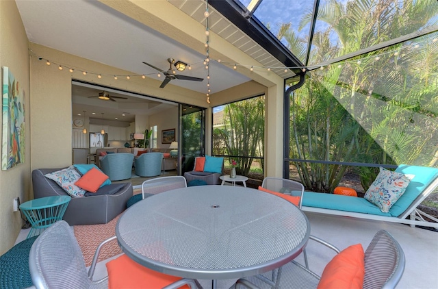 exterior space featuring ceiling fan and an outdoor living space