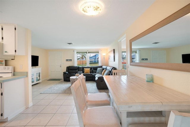 dining room with light tile patterned floors