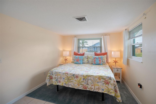 bedroom with a textured ceiling