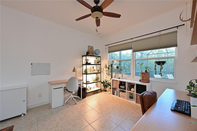 office area featuring ceiling fan and light tile patterned floors