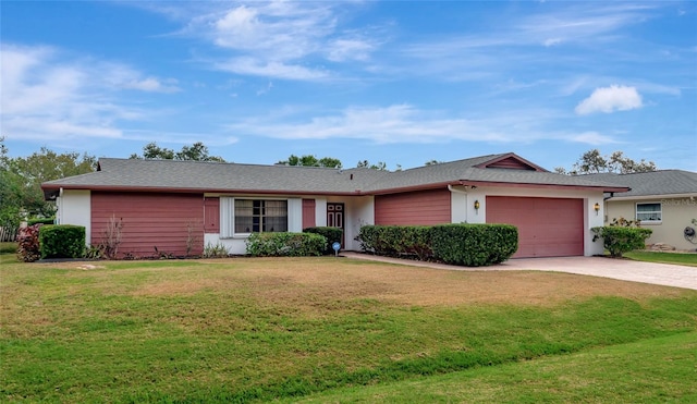 single story home with a garage and a front yard