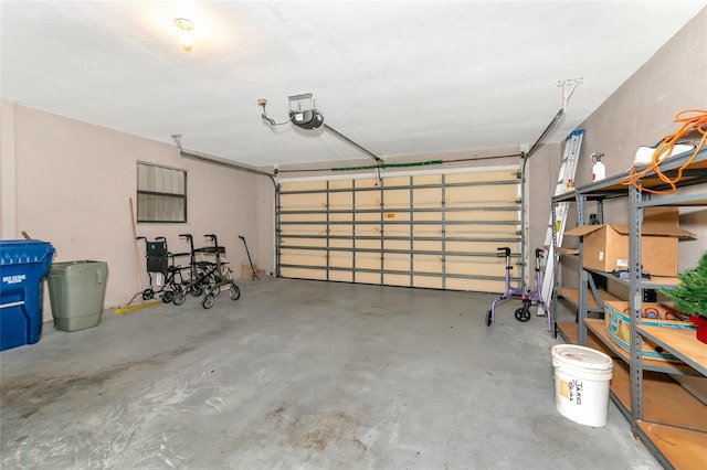 garage featuring a garage door opener