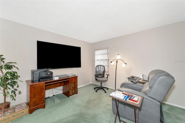 office area featuring light colored carpet and a textured ceiling