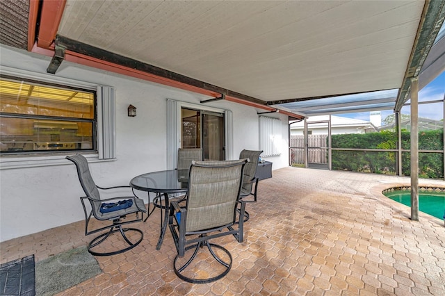 view of patio with a fenced in pool and a lanai