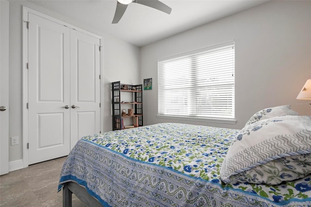 bedroom featuring a closet and ceiling fan