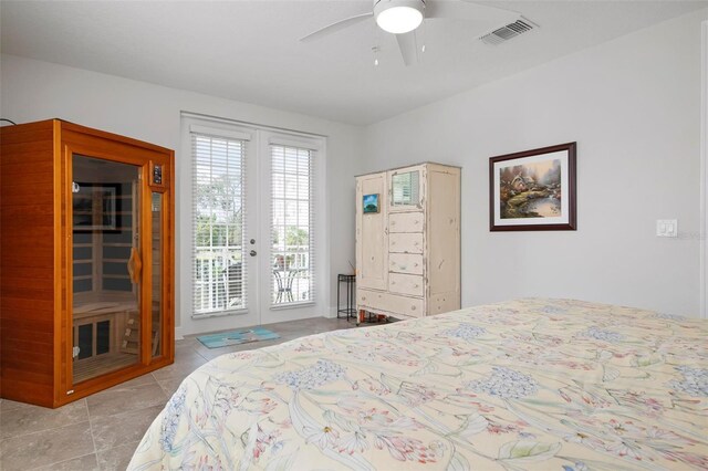 tiled bedroom featuring french doors, access to outside, and ceiling fan