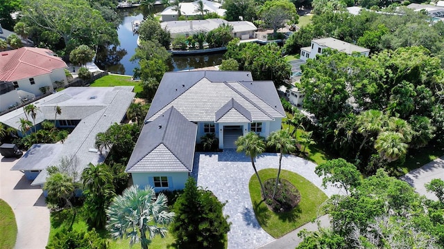 birds eye view of property featuring a water view