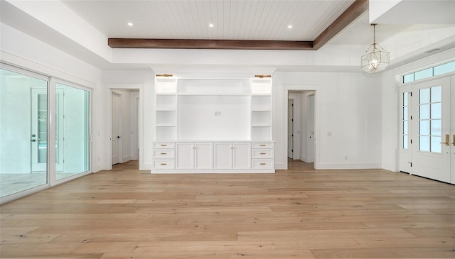 interior space featuring beam ceiling, wooden ceiling, and light hardwood / wood-style floors