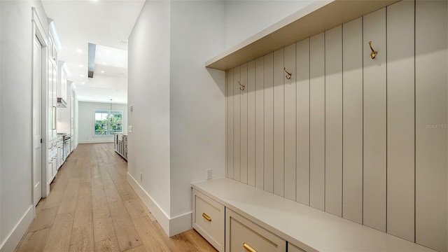 mudroom with light wood-type flooring