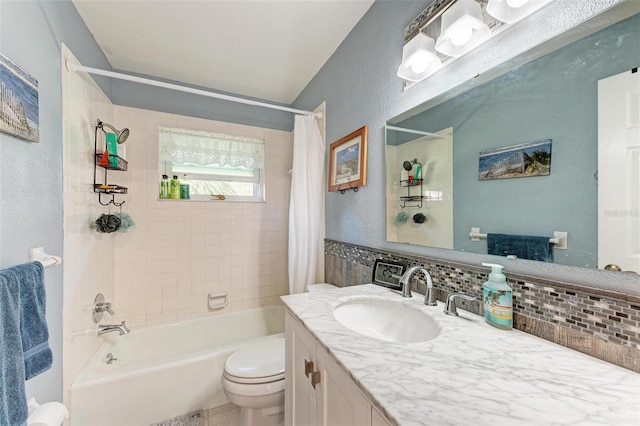 full bathroom featuring vanity, shower / tub combo, backsplash, and toilet