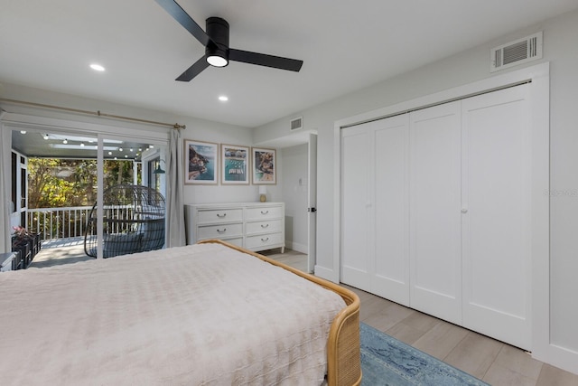 bedroom with access to exterior, ceiling fan, and light hardwood / wood-style floors