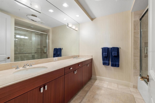 bathroom featuring a textured ceiling, tile patterned flooring, vanity, and an enclosed shower