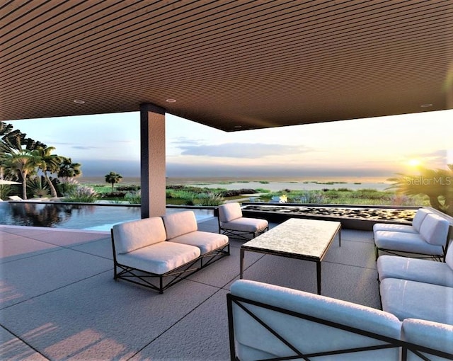 view of patio terrace at dusk