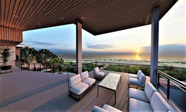 deck at dusk with a water view and an outdoor hangout area