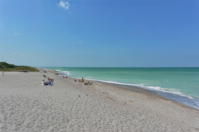 property view of water featuring a view of the beach