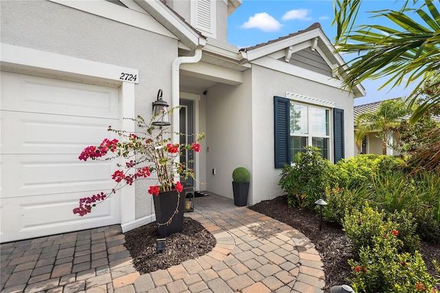 property entrance featuring a garage