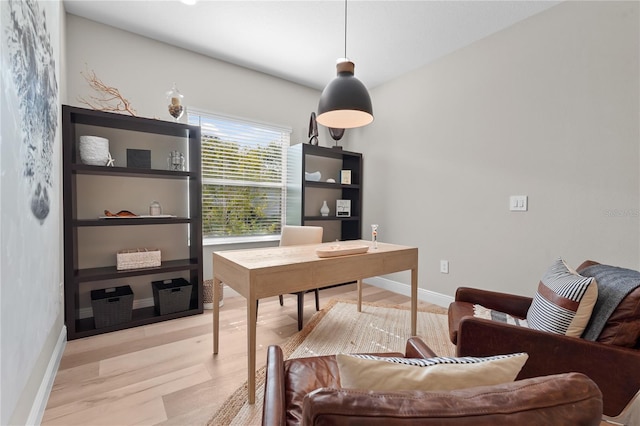 office space with light wood-type flooring