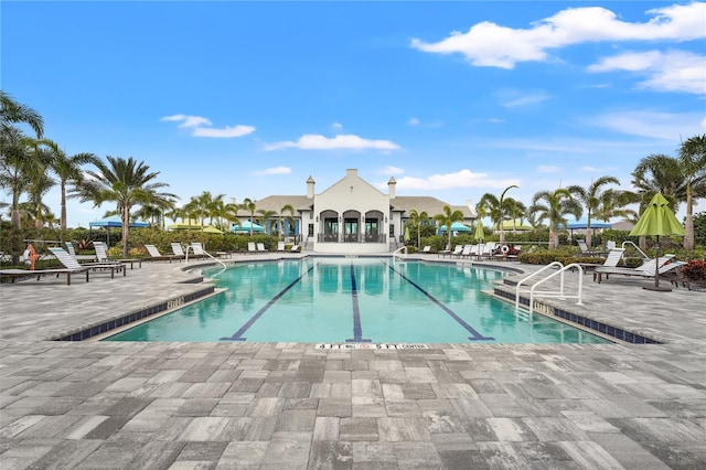 view of swimming pool featuring a patio area