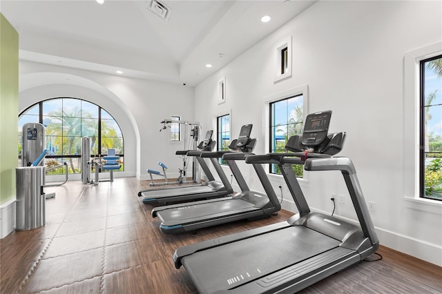 gym with high vaulted ceiling