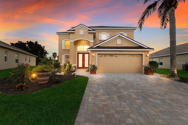 view of front of property featuring french doors and cooling unit