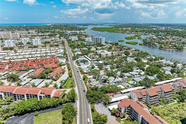 birds eye view of property featuring a water view