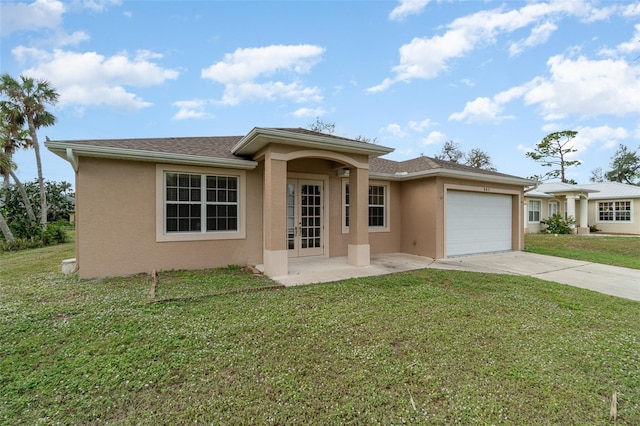 view of front facade featuring a garage and a front lawn