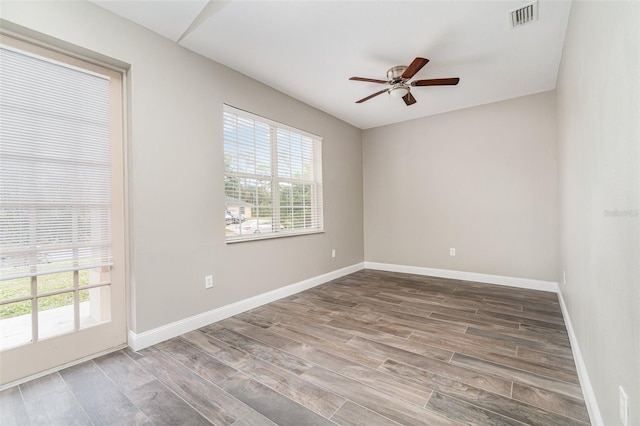 unfurnished room with ceiling fan and wood-type flooring