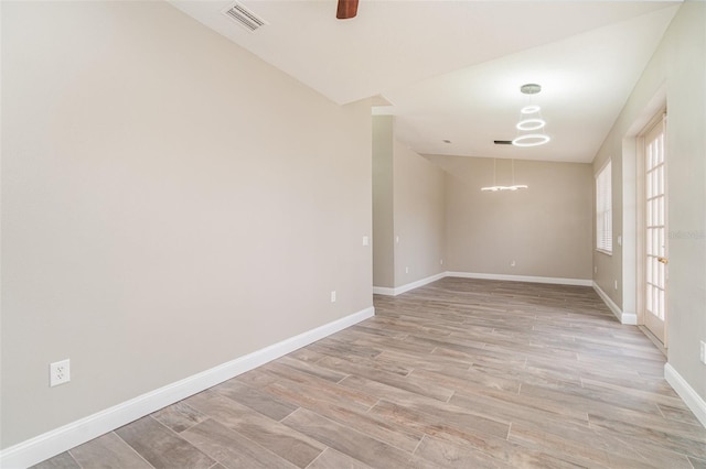 spare room with ceiling fan