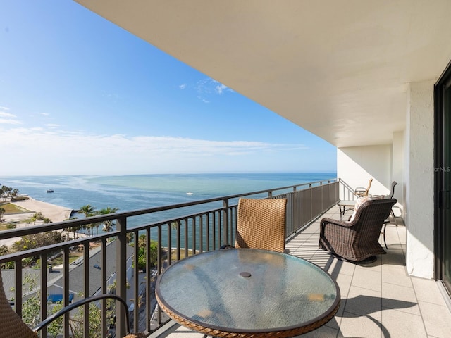 balcony featuring a water view