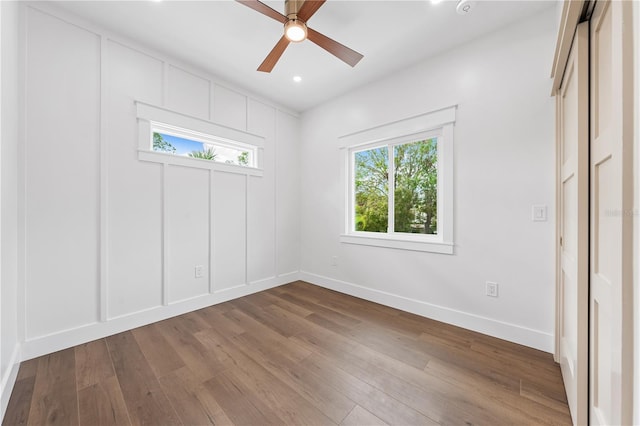 unfurnished room featuring ceiling fan and wood-type flooring