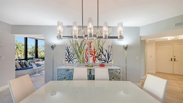 dining area with a chandelier