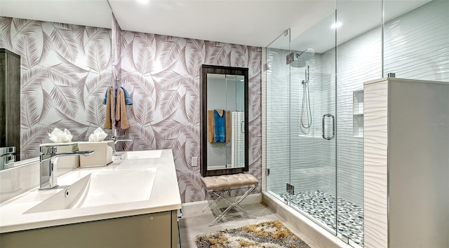 bathroom featuring vanity and walk in shower