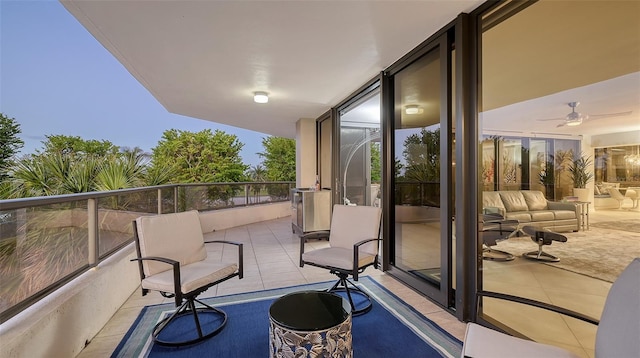 balcony at dusk with ceiling fan