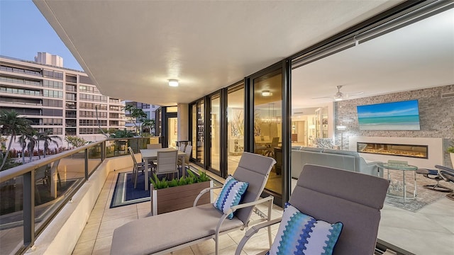 balcony featuring ceiling fan