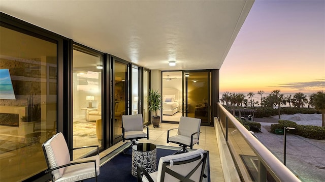 view of balcony at dusk