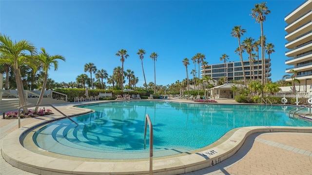 view of pool featuring a patio